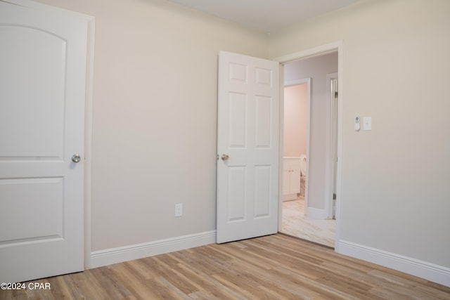 unfurnished bedroom featuring light hardwood / wood-style floors