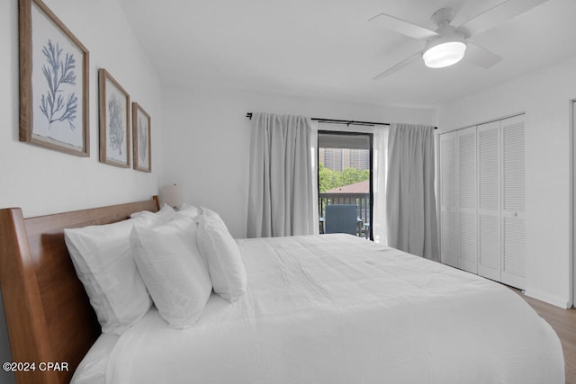 bedroom featuring access to exterior, ceiling fan, a closet, and wood-type flooring