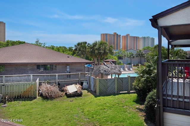 view of yard featuring a fenced in pool