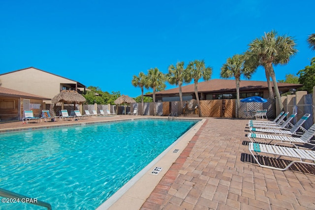 view of pool featuring a patio