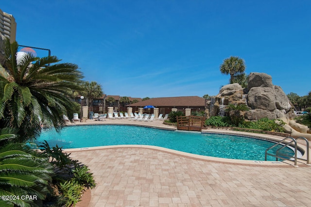 view of swimming pool featuring a patio