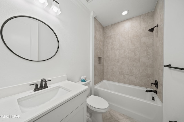 full bathroom featuring vanity, tile patterned floors, tiled shower / bath combo, and toilet