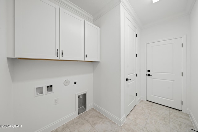 laundry area with ornamental molding, light tile patterned flooring, cabinets, and hookup for an electric dryer