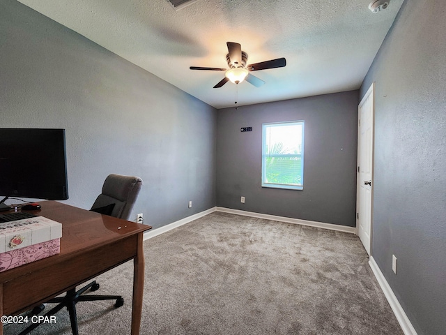 office with carpet, a textured ceiling, and ceiling fan