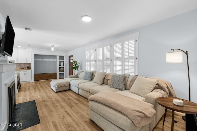 living room featuring light wood-type flooring