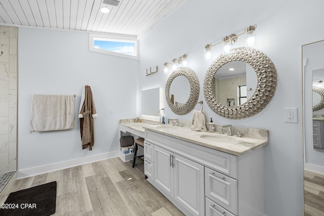 bathroom with wood ceiling, wood-type flooring, and vanity