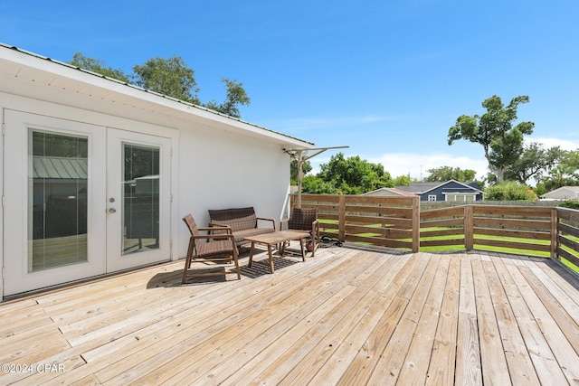 wooden terrace featuring french doors