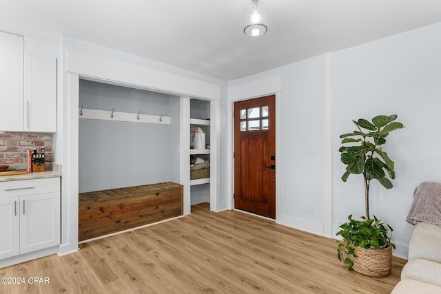 entrance foyer with light wood-type flooring