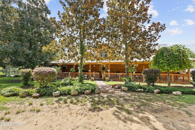 exterior space featuring a deck and a trampoline