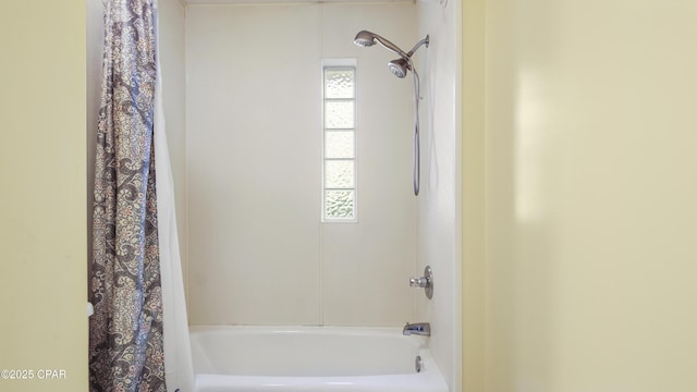 full bathroom featuring shower / tub combo and a healthy amount of sunlight