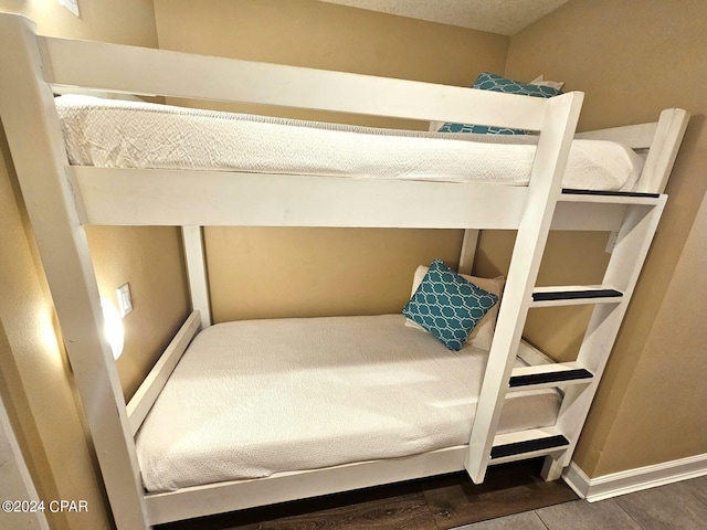 bedroom featuring hardwood / wood-style flooring