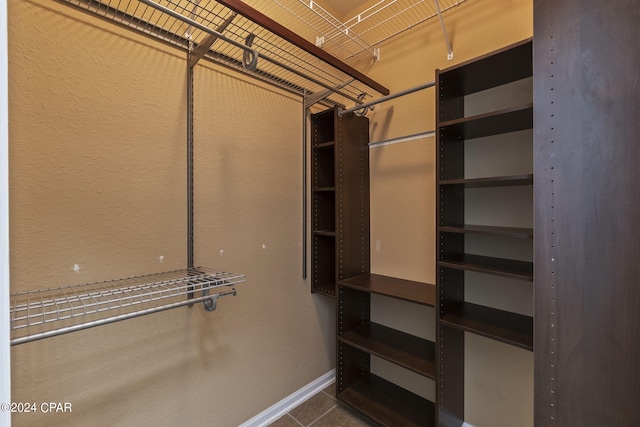 walk in closet featuring tile patterned floors