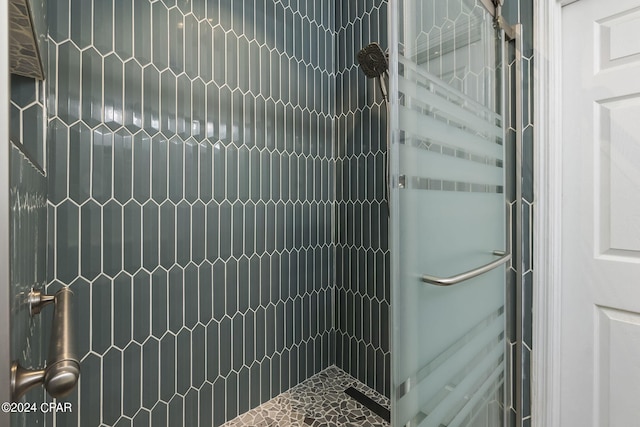 room details with a tile shower