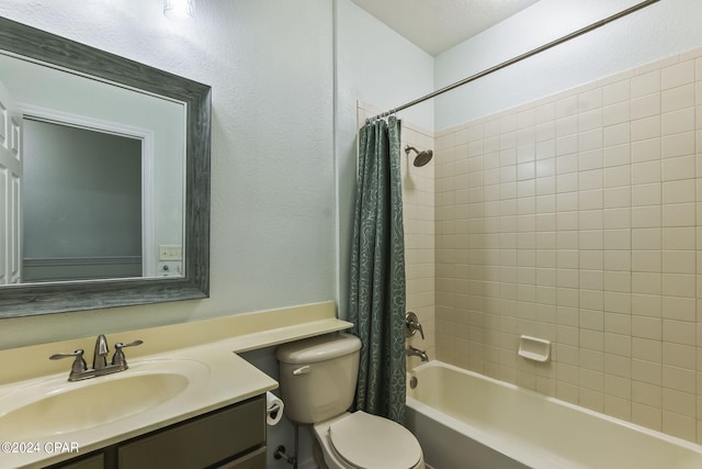 full bathroom with shower / tub combo with curtain, vanity, and toilet