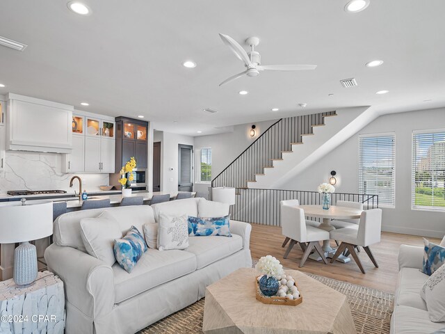 101 Deluna Pl Unit A, Panama City Beach, FL 32413 - living room with recessed lighting, visible vents, and a ceiling fan