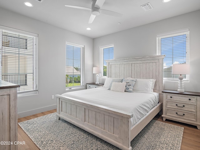 bedroom featuring ceiling fan and light wood-type flooring