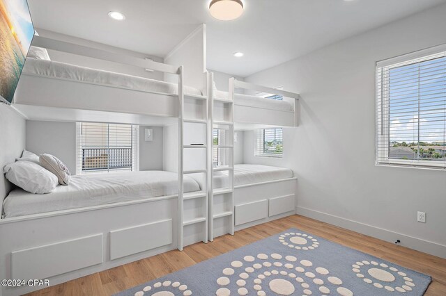 101 Deluna Pl Unit A, Panama City Beach, FL 32413 - bedroom with baseboards, wood finished floors, and recessed lighting