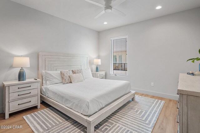 101 Deluna Pl Unit A, Panama City Beach, FL 32413 - bedroom with recessed lighting, light wood-style flooring, baseboards, and ceiling fan