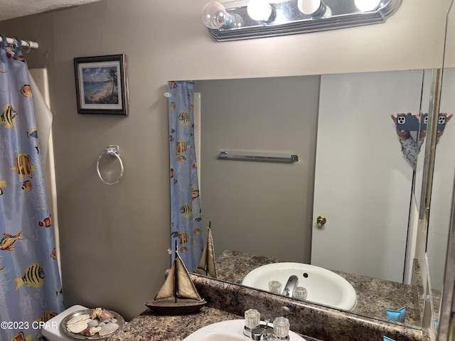 full bathroom featuring vanity and a shower with shower curtain