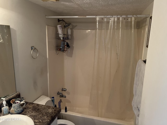 full bath with toilet, shower / bath combination with curtain, a textured ceiling, and vanity