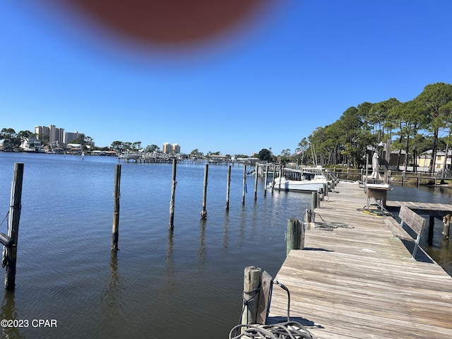 view of dock with a water view