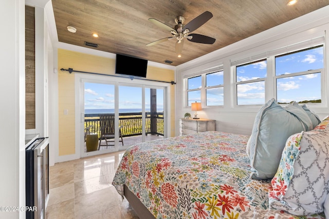 bedroom featuring access to exterior, multiple windows, wooden ceiling, and ceiling fan