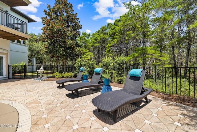 view of patio / terrace featuring a balcony