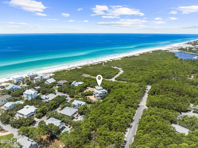 bird's eye view with a water view and a view of the beach