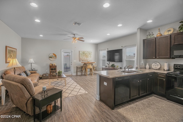 kitchen with black appliances, sink, light hardwood / wood-style floors, dark brown cabinetry, and ceiling fan