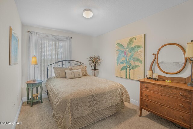 bedroom featuring carpet flooring