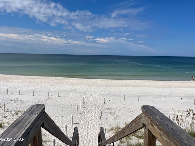 property view of water featuring a beach view