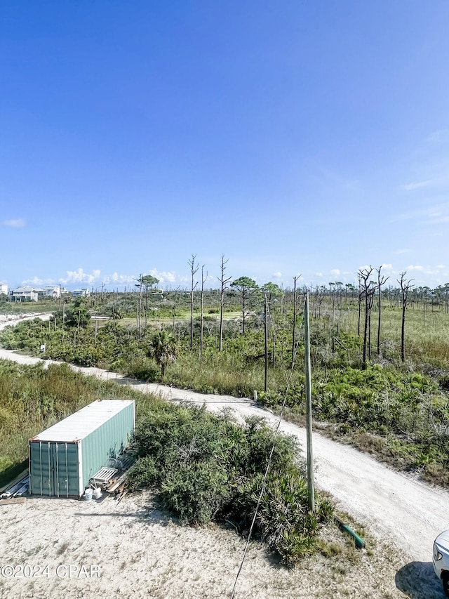 exterior space with a rural view