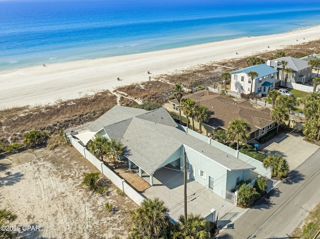 drone / aerial view with a view of the beach and a water view