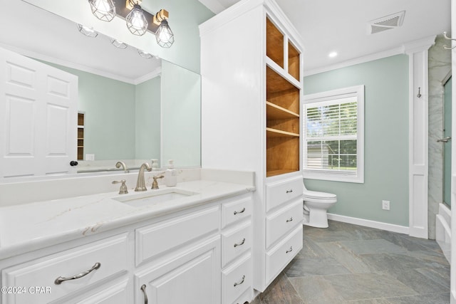 bathroom with vanity, toilet, and ornamental molding