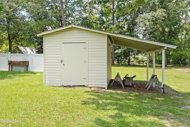 view of outdoor structure with a yard