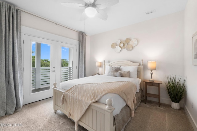 bedroom featuring french doors, light colored carpet, access to exterior, and ceiling fan