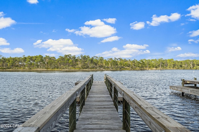 view of dock with a water view