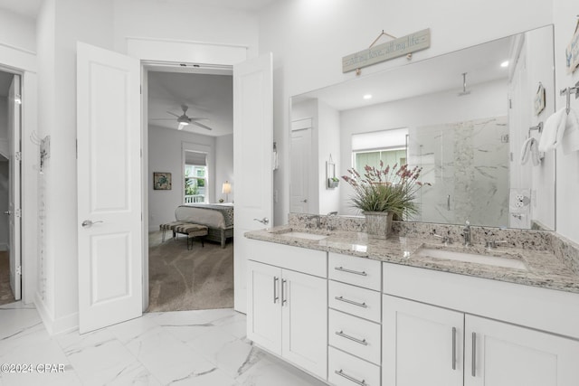 bathroom with ceiling fan, dual bowl vanity, and tile patterned flooring