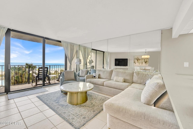 tiled living room with a wall of windows