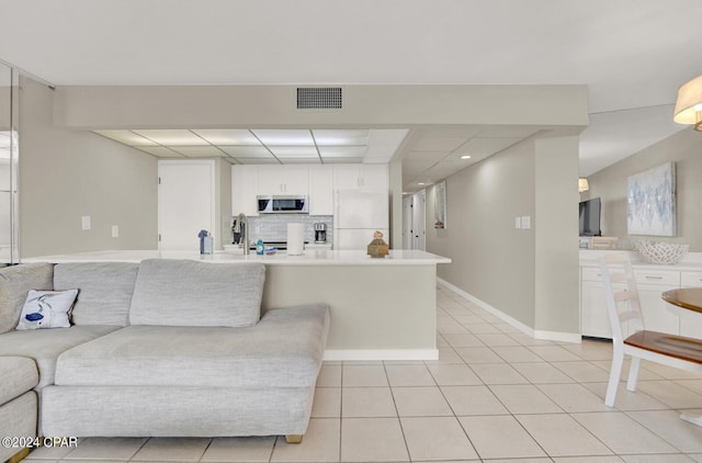 tiled living room with sink