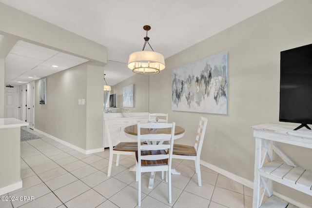 dining area featuring light tile patterned floors