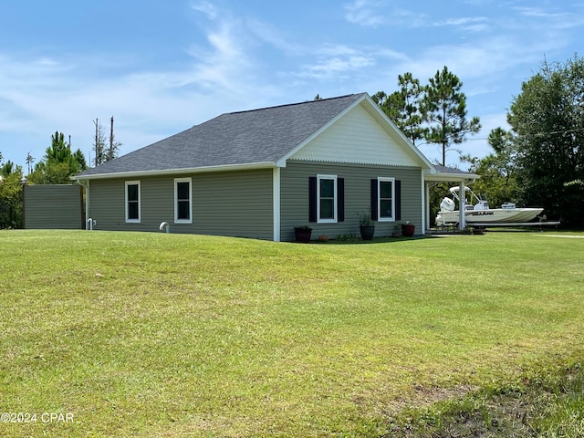 exterior space with a yard