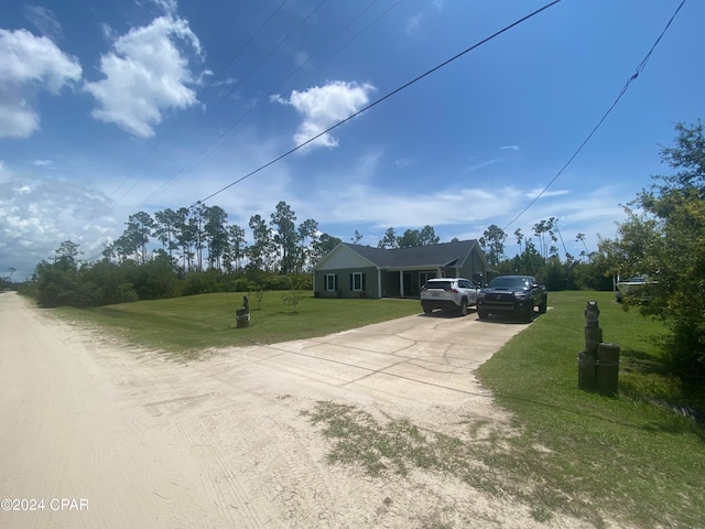 view of front of home with a front yard