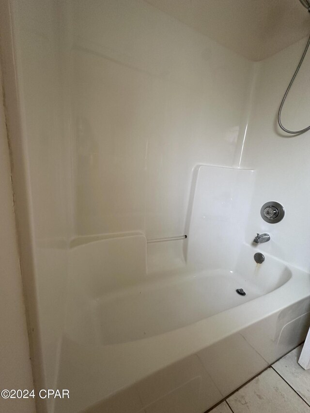 bathroom with shower / bathtub combination and tile patterned floors