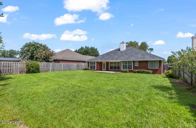 exterior space featuring a yard