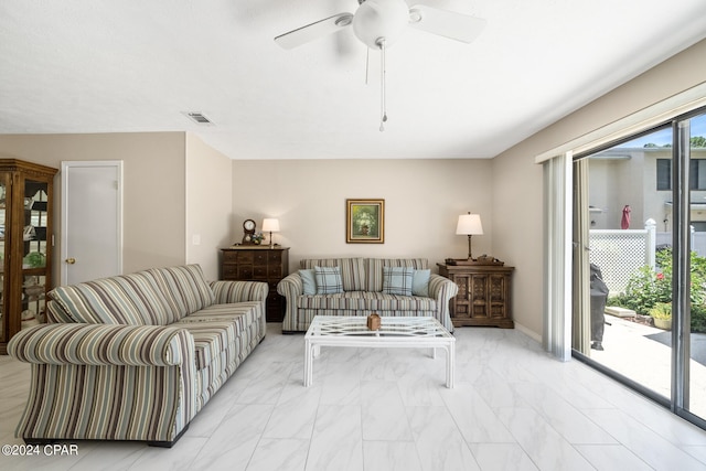 living room featuring ceiling fan