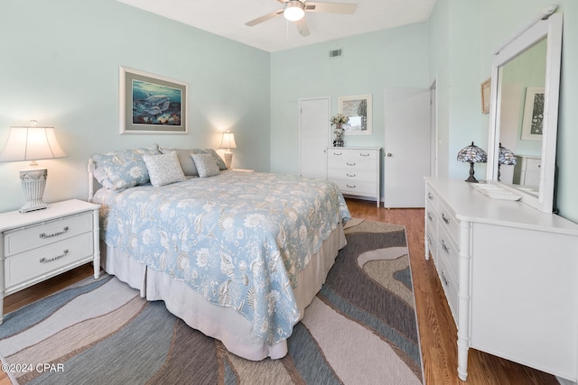 bedroom featuring ceiling fan and hardwood / wood-style flooring