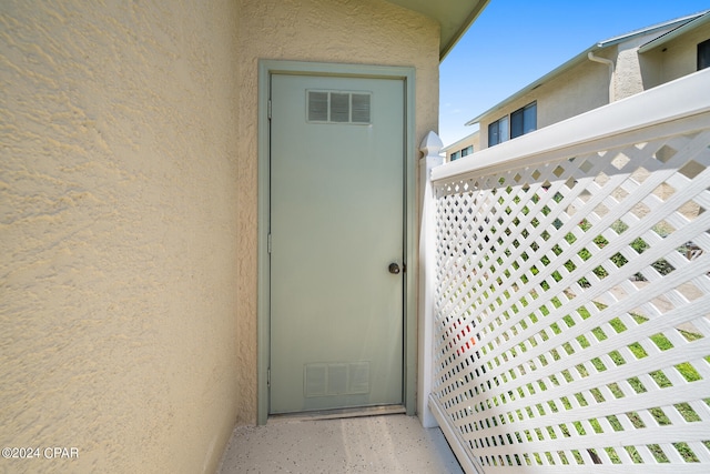 doorway to property with a balcony