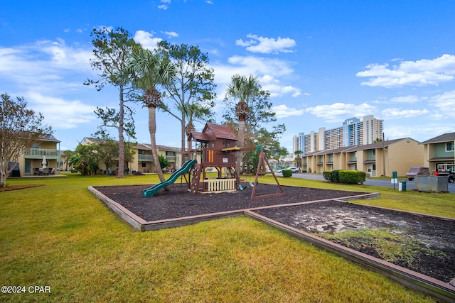 view of play area featuring a lawn