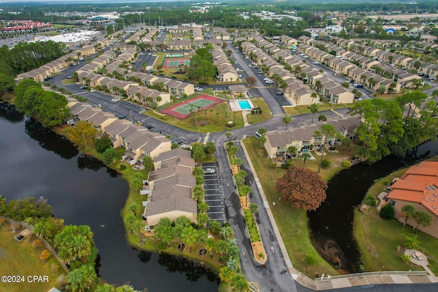 drone / aerial view with a water view